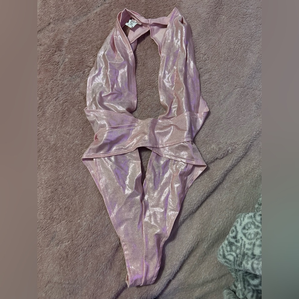 Light shiny pink body suit